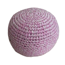 Pink crocheted ball on a white background
